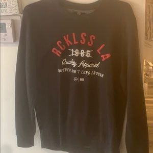 Young and reckless crew neck sweater